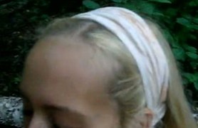 sweet russian girl giving head in the forest.
