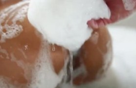 good ass enjoys a wet bathtub delight